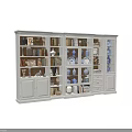 White Display Bookcase With Glass Doors Holding Blue And White Vases Books And Decorations