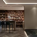 Home Theater Interior With Wall Of Wine Bottles Bar Counter And Black Chairs