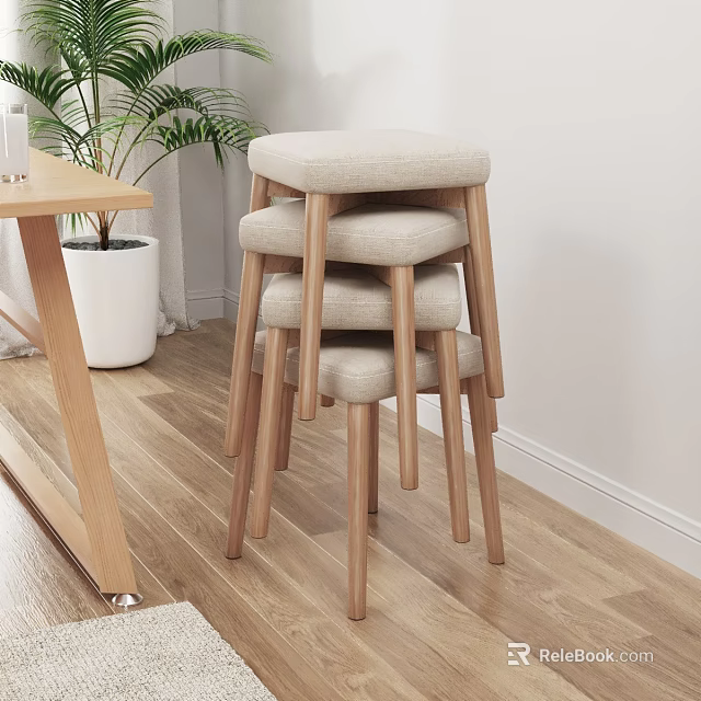 Stacked Stools With Beige Padded Seats And Wooden Legs On Light Wood Floor 3d model 