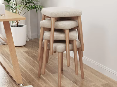 Stacked Stools With Beige Padded Seats And Wooden Legs On Light Wood Floor 3d model