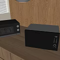 Sleek Modern Black Kitchen Microwave And Oven Appliances On Wooden Countertop