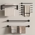Towels On Wall Mounted Black Racks With Light Colored And Striped Designs