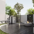Courtyard Garden Featuring Circular Wooden Deck Fire Pit Green Trees White Walls And Lighting