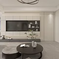 Bright Modern Living And Dining Room Interior With Full TV Wall And Round Coffee Tables