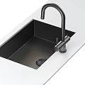 Modern Stainless Steel Kitchen Sink With Black Faucet On White Countertop