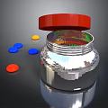 Silver Storage Jar With Open Red Lid And Colorful Small Round Pieces On Black Surface