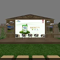 Rural Themed Exhibition Space With Wooden Structure Green Lawn Arranged Seats Large Screen And Cow Models