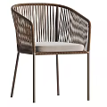 Dark Rattan Leisure Chair With Metal Legs Armrests And Light Cushion