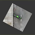 Green Motorcycle Parked On Road With Stone Pavement Scenic Setup