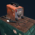 Orange BX1160S Welding Machine on a Green Old Box with Cables and Welding Torch 3d model