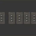 Brown Control Panels With Three Circular Buttons Each Arranged On Grey Reflective Surface