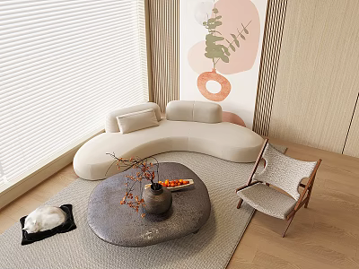 Curved Beige Sofa And Round Coffee Table Set With Decorative Items In Modern Living Room 3d model