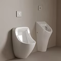 Two Modern White Wall Mounted Urinals With Sleek Design In Bathroom