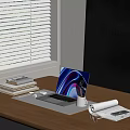 Modern Laptop With Colorful Screen On Wooden Desk Coffee Cup Books And Canon Logo