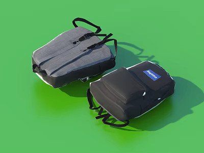 Modern Gray And Black Backpacks With Adjustable Straps On Green Background 3d model