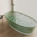 Green Transparent Oval Bathtub with Water in Room with Wooden Floor Blinds and Side Table