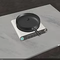 Black Frying Pan with Wooden Handle on White Stove Featuring Digital Display Kitchen Cookware