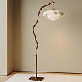 Stylish Curved Branch Floor Lamp With White Pleated Shade In Living Room Corner