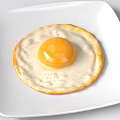 Fried Egg With Runny Yolk And Golden Edges On White Square Plate