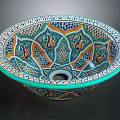 Intricately Carved Colorful Ceramic Basin With Traditional Floral And Geometric Patterns