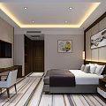 Modern Hotel Guest Room With King Bed White Pillows Desk And Decorative Paintings