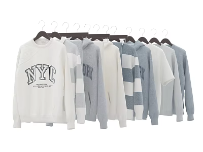 Stylish NYC Printed Sweatshirts in White Gray and Striped Hanging on Hangers 3d model
