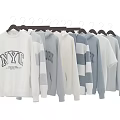 Stylish NYC Printed Sweatshirts in White Gray and Striped Hanging on Hangers