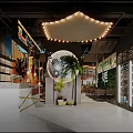 Restaurant Interior Design With Large Mirror Ball Palm Tree String Light Chandelier And Green Plants