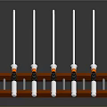 Orange Sturdy Rack With Neatly Arranged White Long Rods And Black Spiral Bases