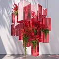 Art Installation Featuring Red Transparent Cubes With Red Flowers And Green Plants