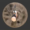Man's Foot Model With Ankle Chain Displayed On Round Stone Base