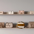 Stylish Handbags With Various Designs In Neutral Tones Displayed On Wall Shelves