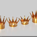 Four Different Sizes Golden Crowns Jewelry Arranged in a Row with Spiked Design