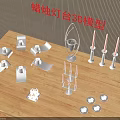 Candle Holder 3D Models With Various Designs Displayed On Wooden Table