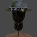Green Military Style Helmet With Wide Brim And Brown Strap On Mannequin Head