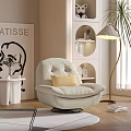Beige Single Sofa with Yellow Pillow Floor Lamp and Bookshelf in Modern Living Room
