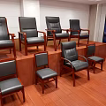 Modern Leather Office Chairs with Armrests Arranged on Wooden Floor for Office Use