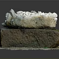 Natural Rock Formation With White Crystal Stone And Mossy Gravel Base