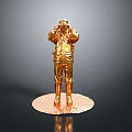 Golden Human Figure Statue With Shiny Surface On Round Base