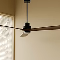 Modern Ceiling Fan with Light Wooden Blades and Black Downrod in Room with Window Blinds
