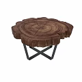 Natural Wood Slice Coffee Table with Black Metal Cross Legs and Visible Growth Rings Design