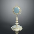 Ornate Decorative Object With Golden Sunburst Design Blue Center And Carved White Base