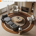 Black Curved Leather Sofa and Round Wooden Coffee Table with Magazines on Top