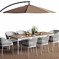 Modern Outdoor Dining Set With Wooden Table Rattan Chairs And Umbrella On Deck