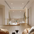 Cozy Attic Space With Brown Round Sofas Bookshelves TV And Green Plant