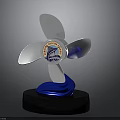 Artistic Propeller Shaped Sculpture With Three Blades Central Emblem Blue Wave Base And Black Pedestal