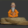 Man With Bald Head And Long White Beard In Orange Robe Sitting Cross-Legged On Rock