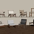 Armchair Collection With Various Woven And Upholstered Designs On Herringbone Floor And Light Wall