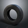 Car Tire With Black Rubber Tread Pattern For Vehicle Performance And Safety