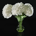White Pink And Blue Hydrangeas In Glass Vases On Black Tabletop With Green Leaves